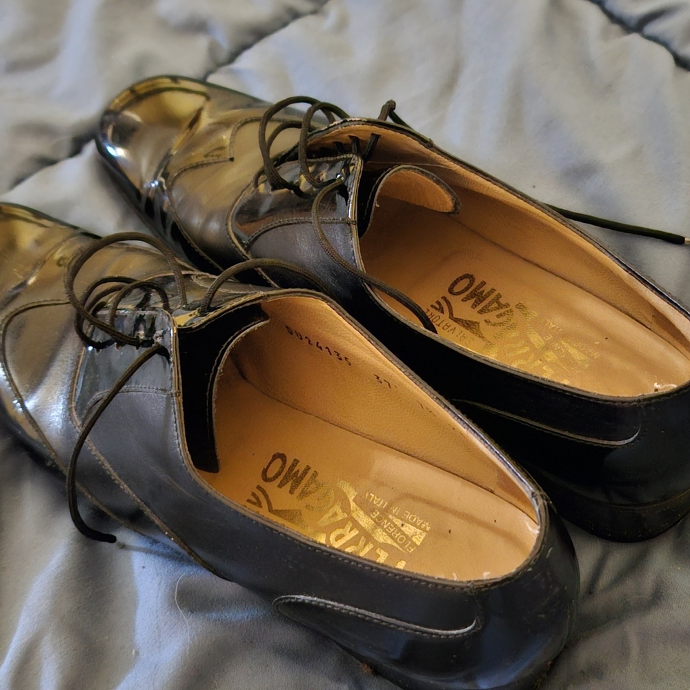 Salvatore Ferragamo Shiny Black Lace-Up Flats